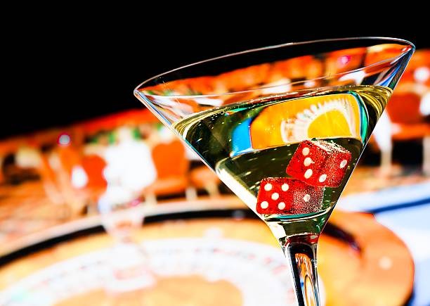 Live Sic Bo dealer with three dice in transparent cup